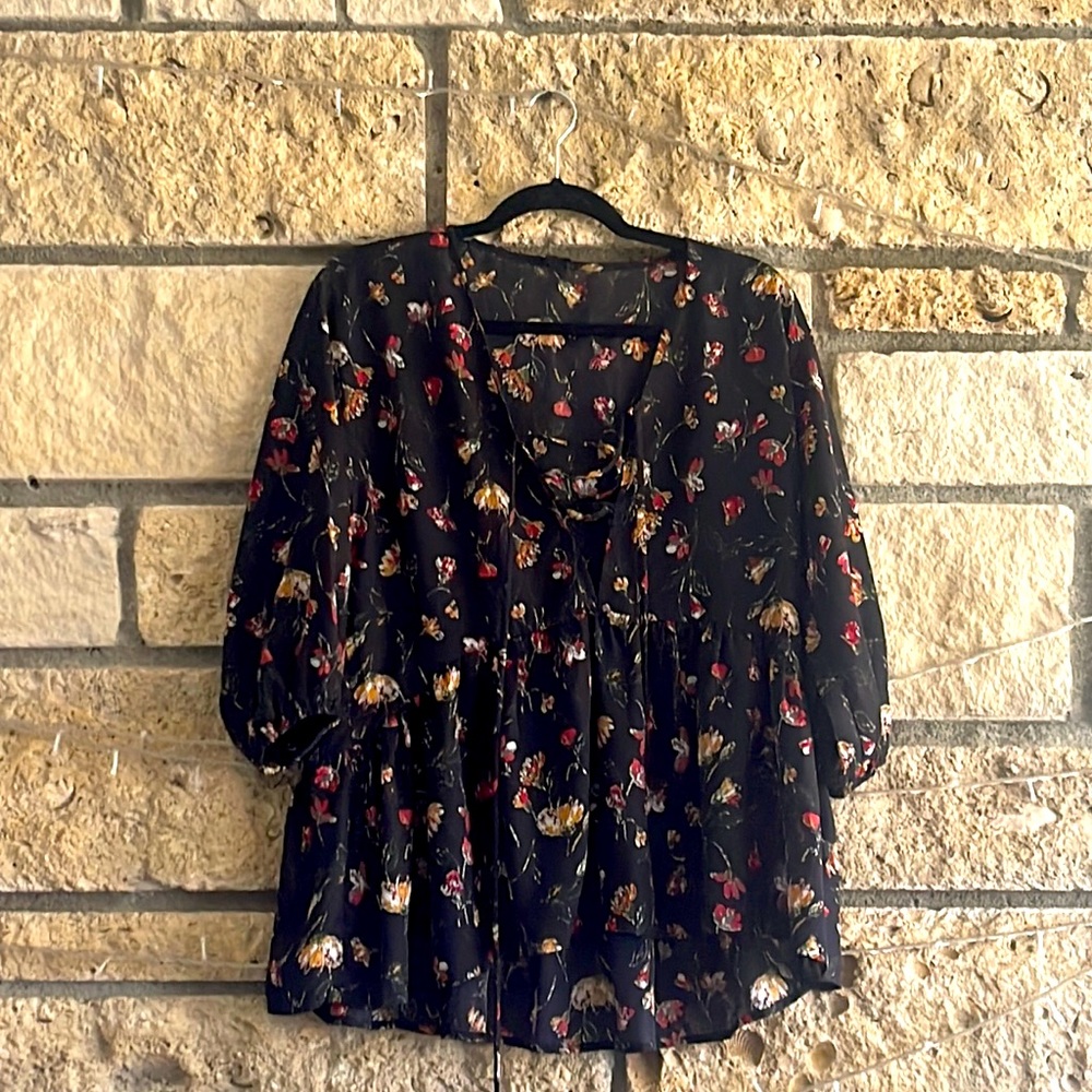 LUCCA black, floral, peplum blouse with front tie. Size S.